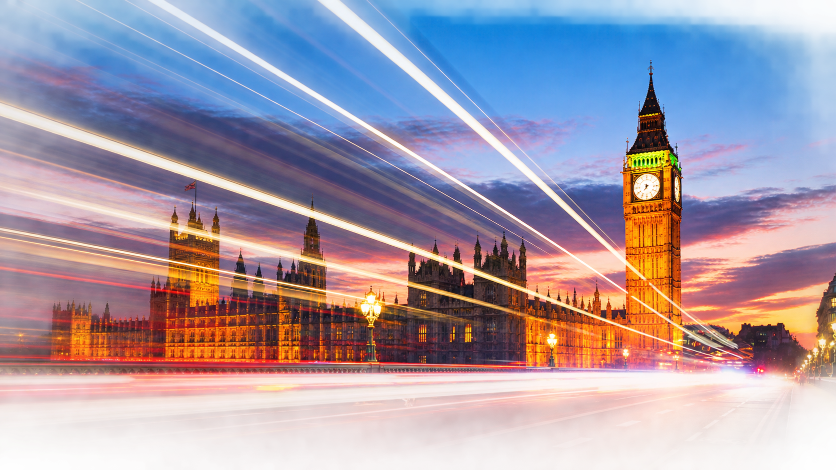 Big Ben and London city lights with traffic trails